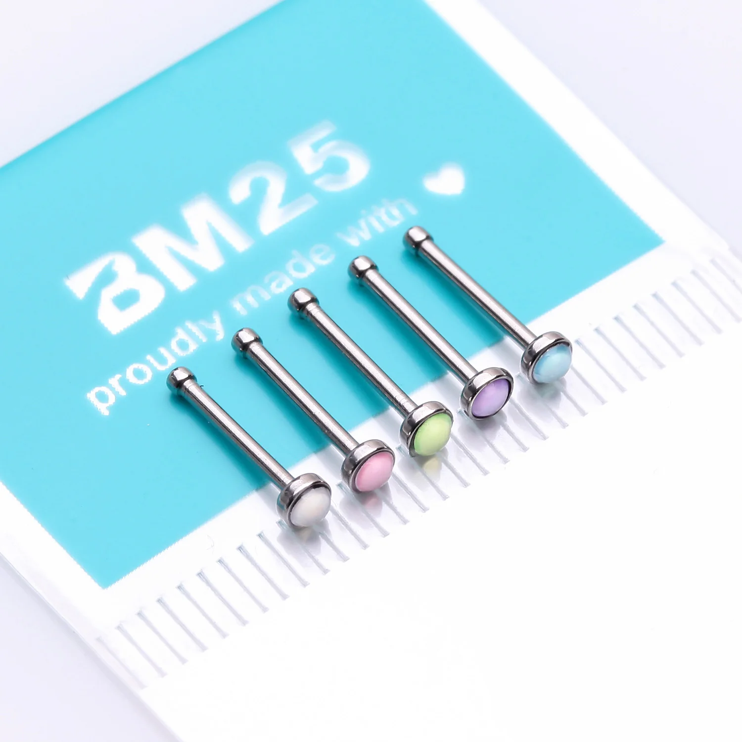 5 Pcs of Assorted Color Iridescent Revo Bezel Set Nose Stud Ring Package - Image 2