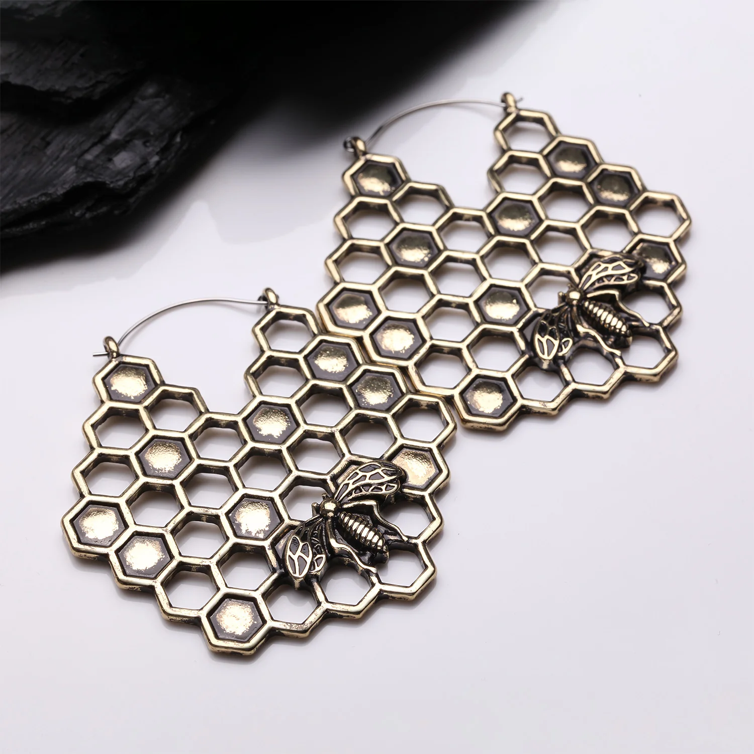 A Pair of Antique Golden Bee and Honeycomb Plug Hoop Earring