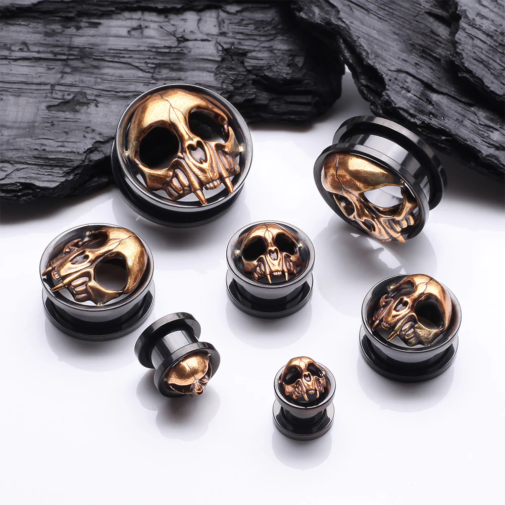 A Pair of Blackline Golden Rustic Skull Screw-Fit Tunnel Plug - Image 3