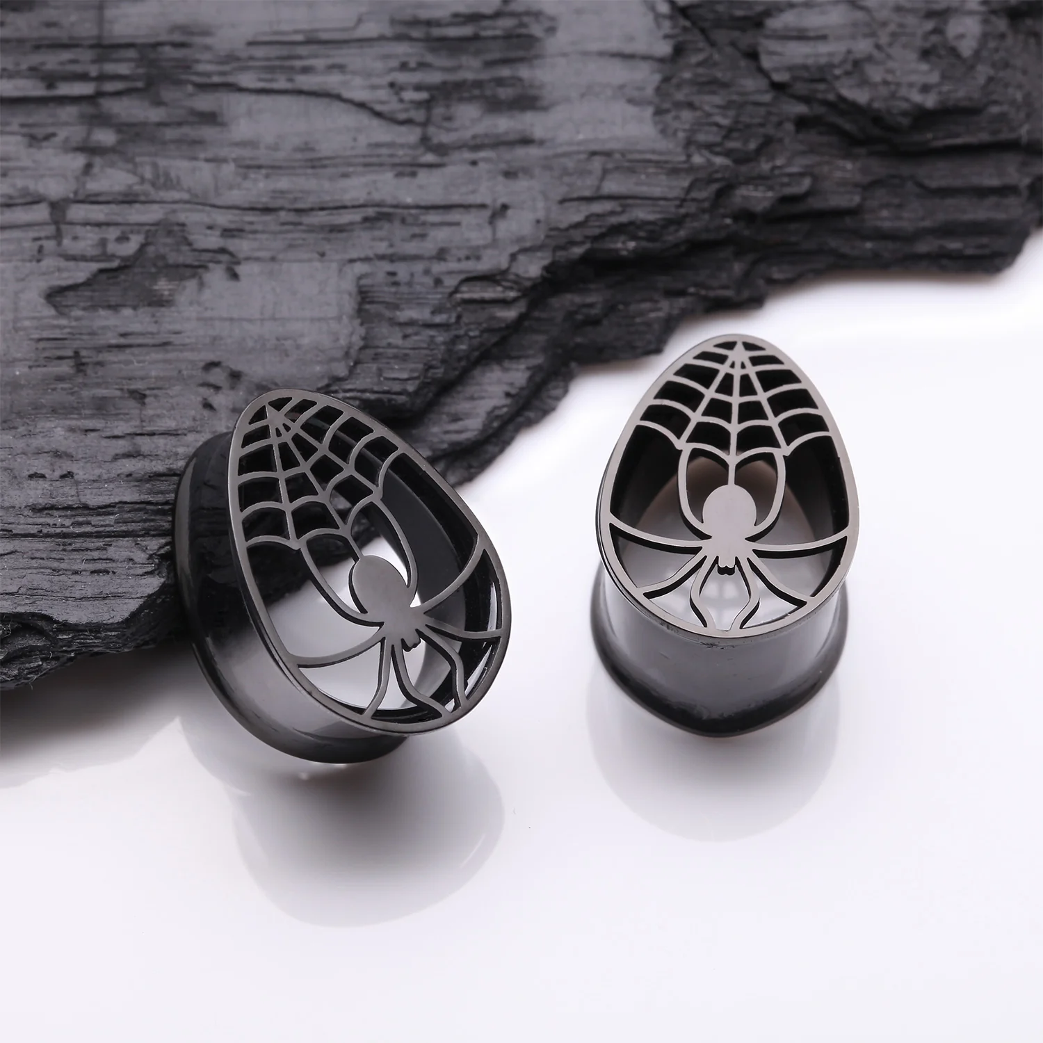 A Pair of Blackline Spider Webbed Teardrop Hollow Steel Tunnel Plug - Image 2