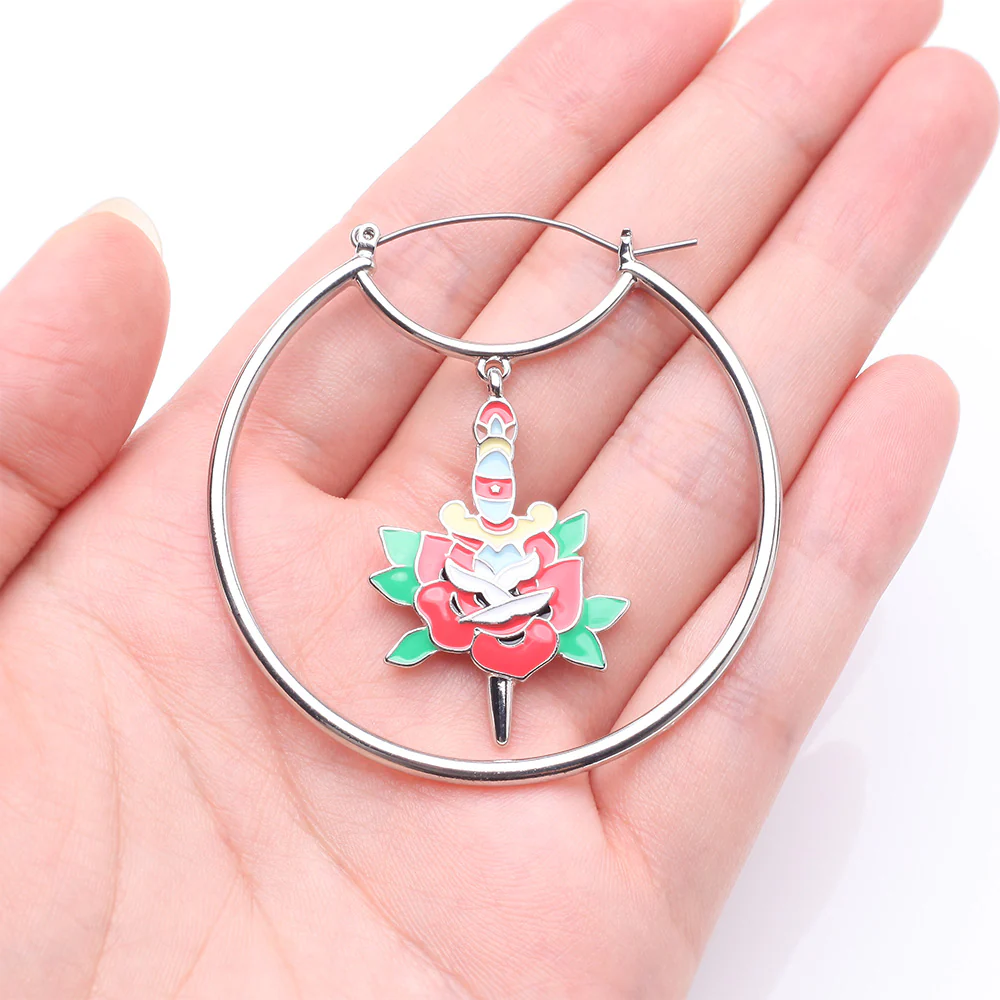A Pair of Dagger and Rose Blossom Tattoo Art Plug Hoop Earring - Image 3