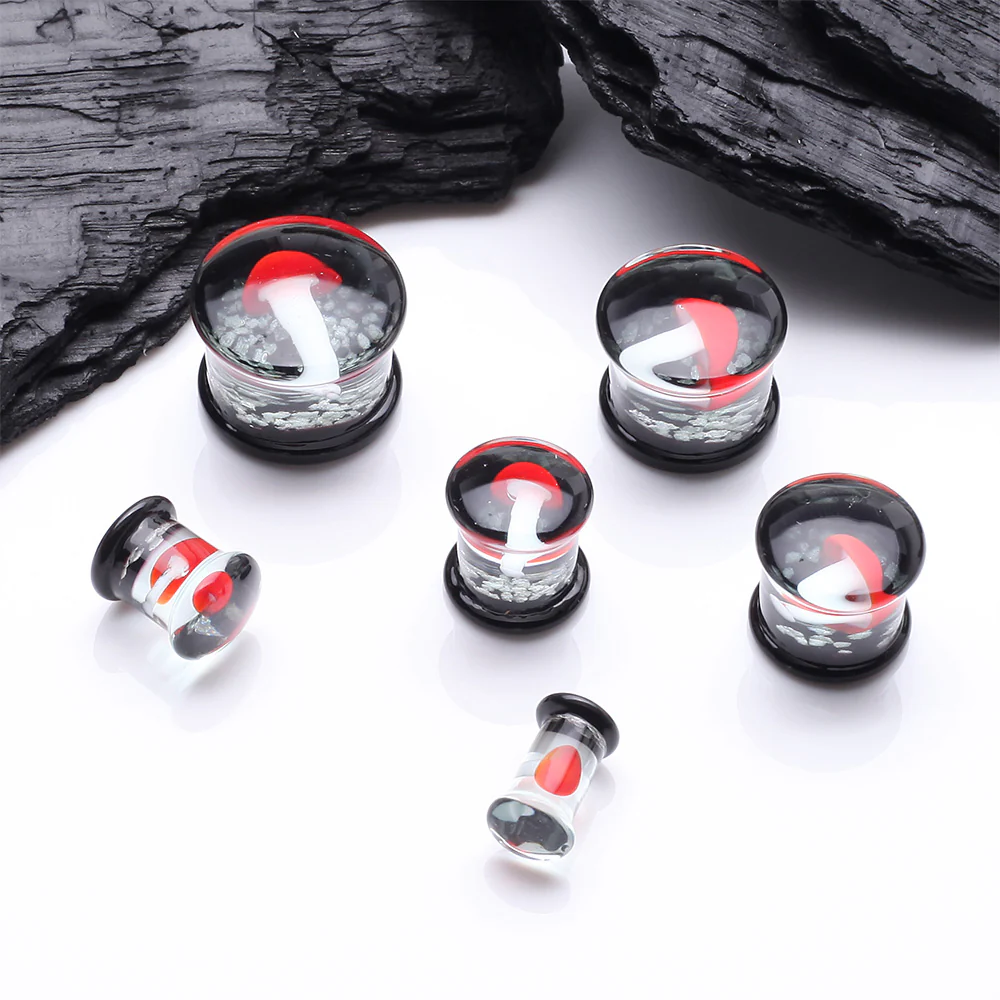 A Pair of Enchanted Red Mushroom Glow in the Dark Double Flared Glass Plug - Image 3