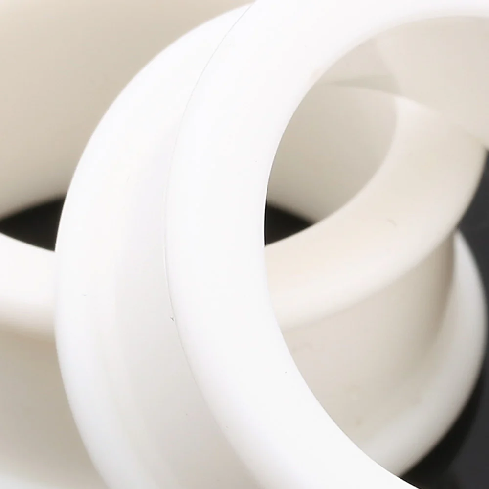 A Pair of Flexible Silicone Double Flared Ear Gauge Tunnel Plug - Image 5