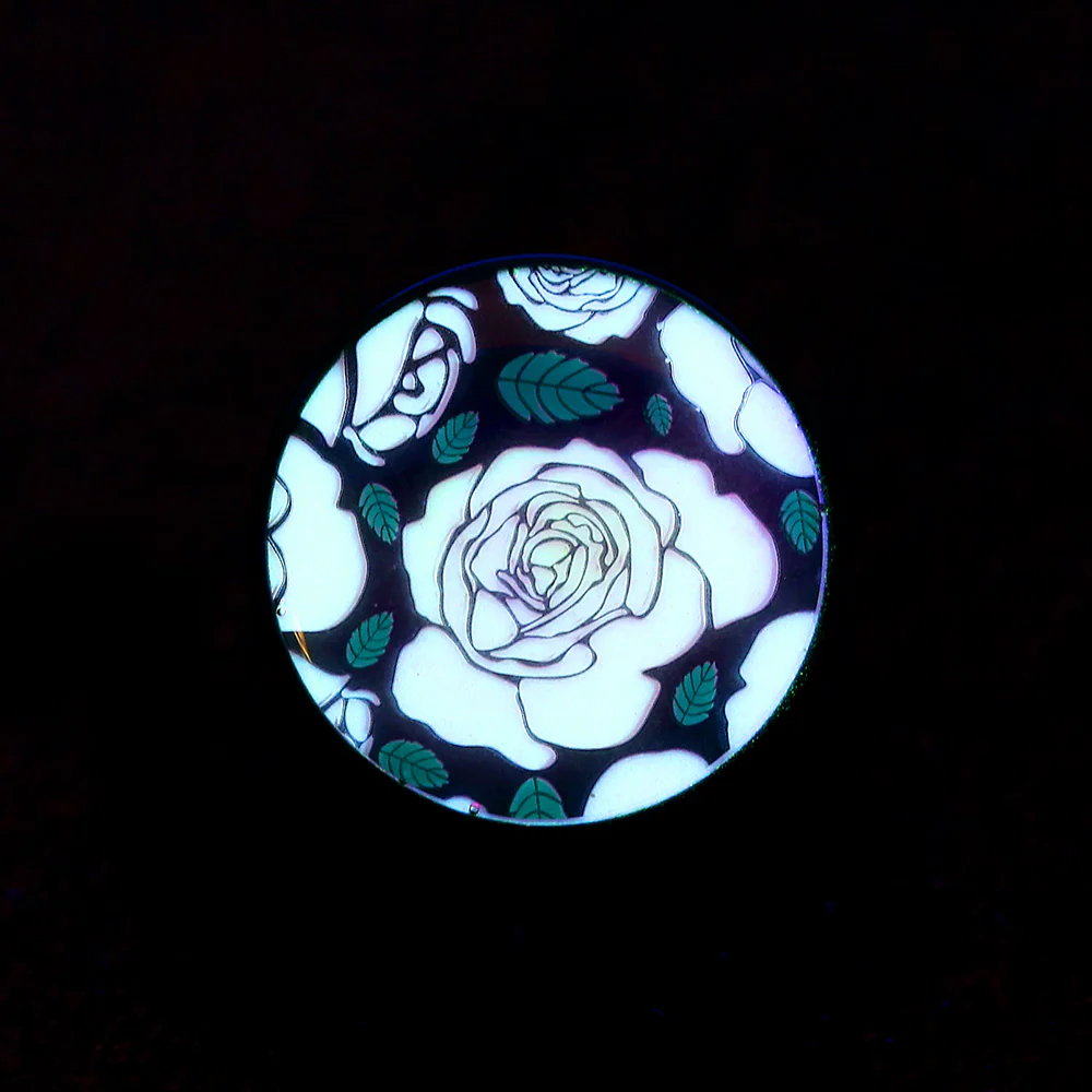 A Pair of Glow in the Dark Romantic Roses Single Flared Ear Gauge Plug - Image 3