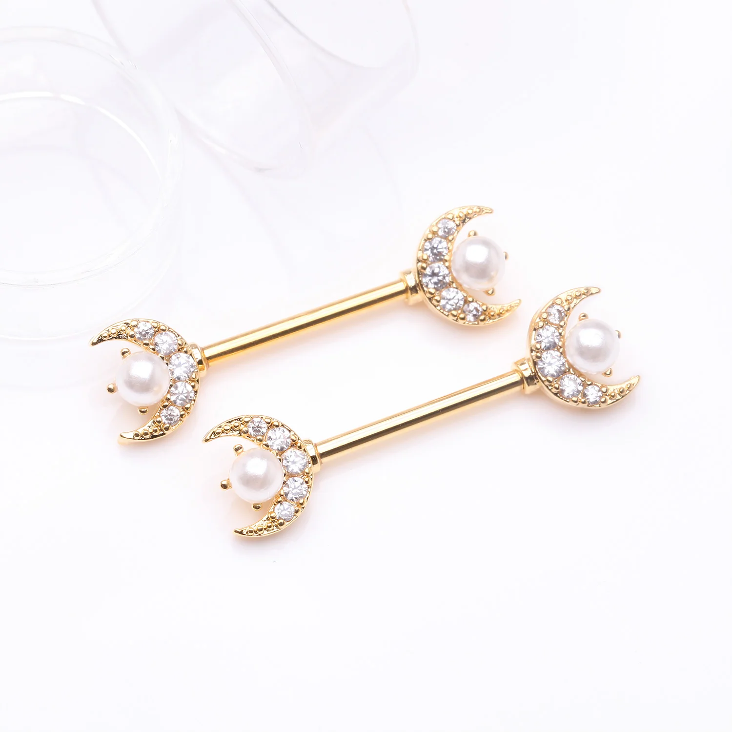 A Pair of Golden Pearlescent Crescent Moon Sparkle Nipple Barbell