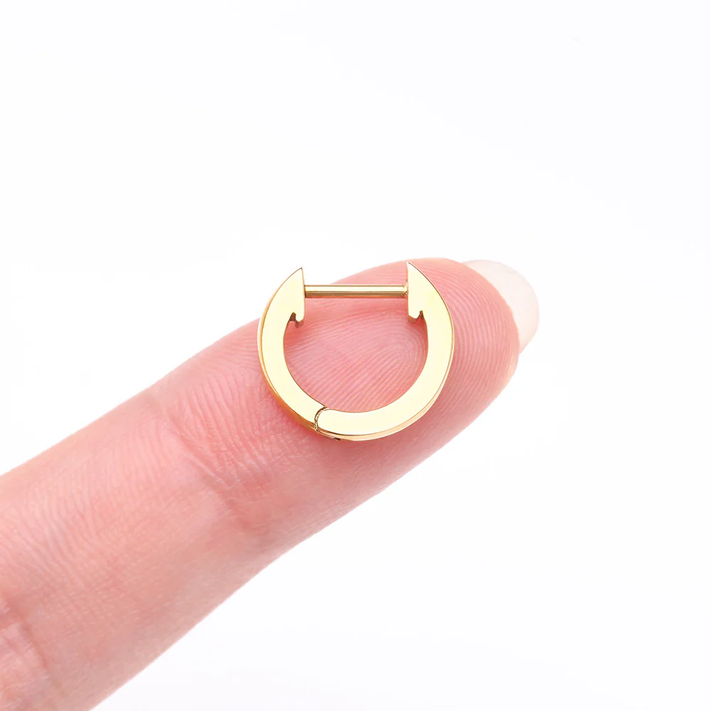 A Pair of Golden Simple Huggie Hoop Steel Earring - Image 3