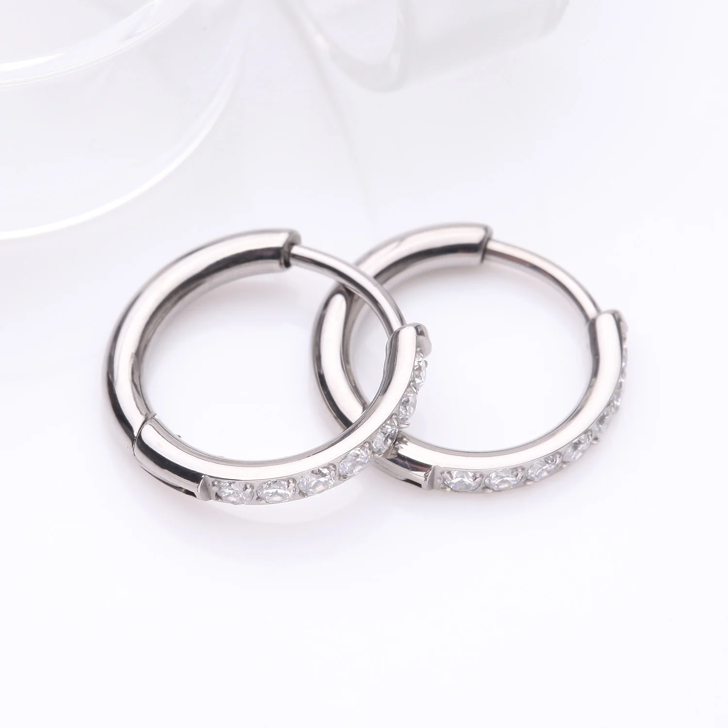 A Pair of Implant Grade Titanium Gem Lined Huggie Hoop Earring - Image 2