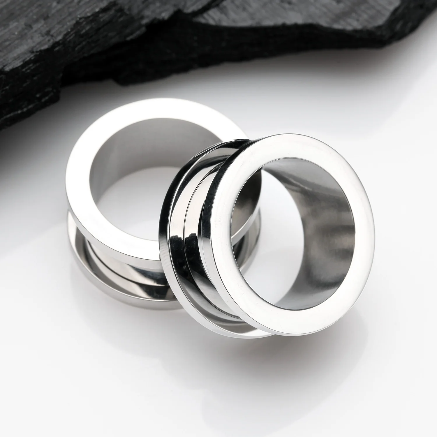 A Pair of Implant Grade Titanium Screw-Fit Tunnel Plug - Image 2