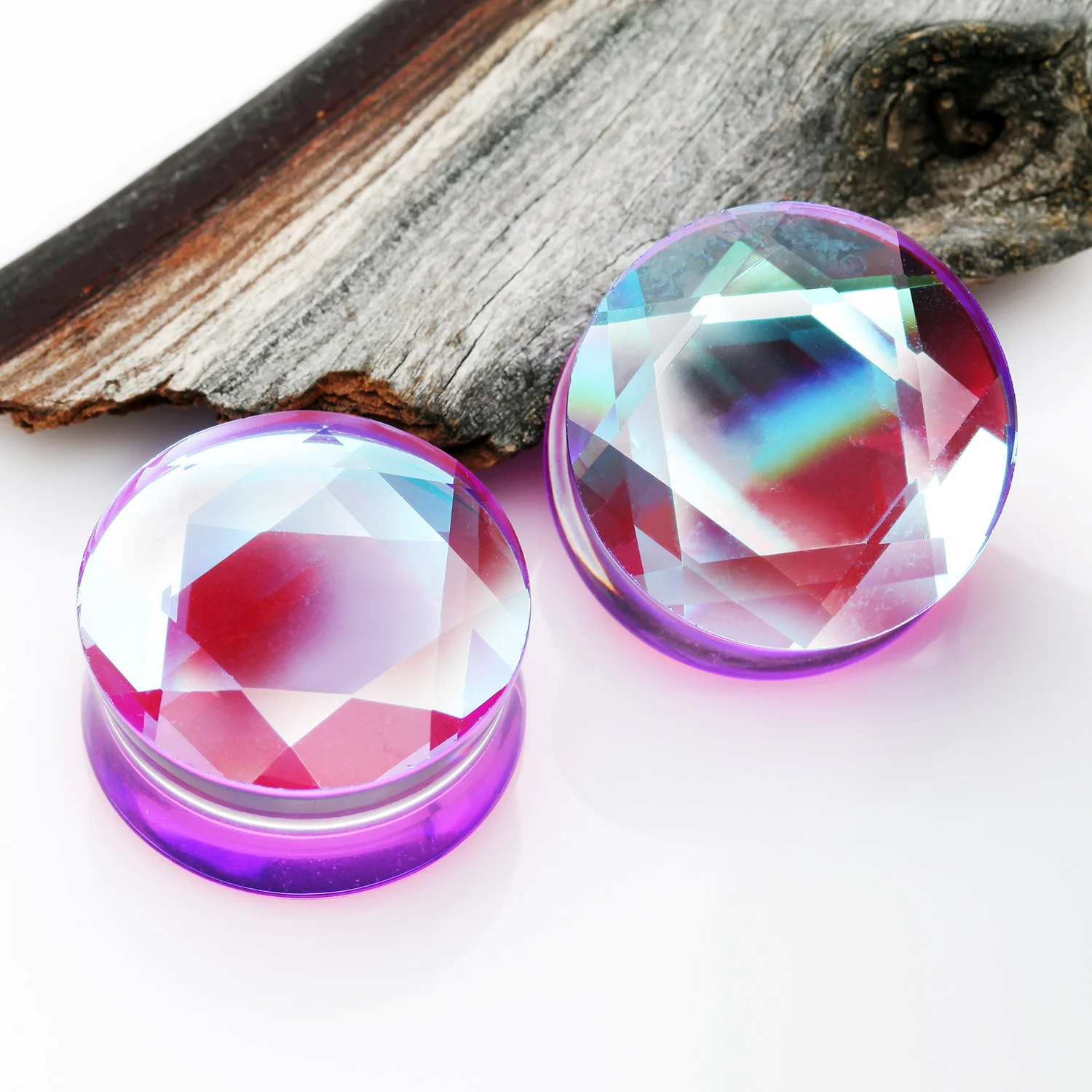 A Pair of Iridescent Multi-Faceted Glass Double Flared Plug - Image 2