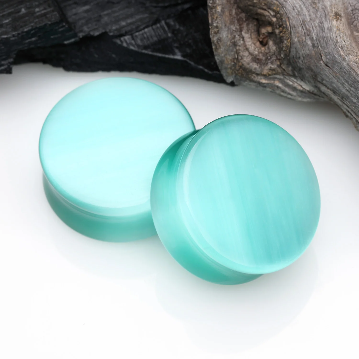 A Pair of Mint Cat-Eye Stone Double Flared Ear Gauge Plug - Image 2