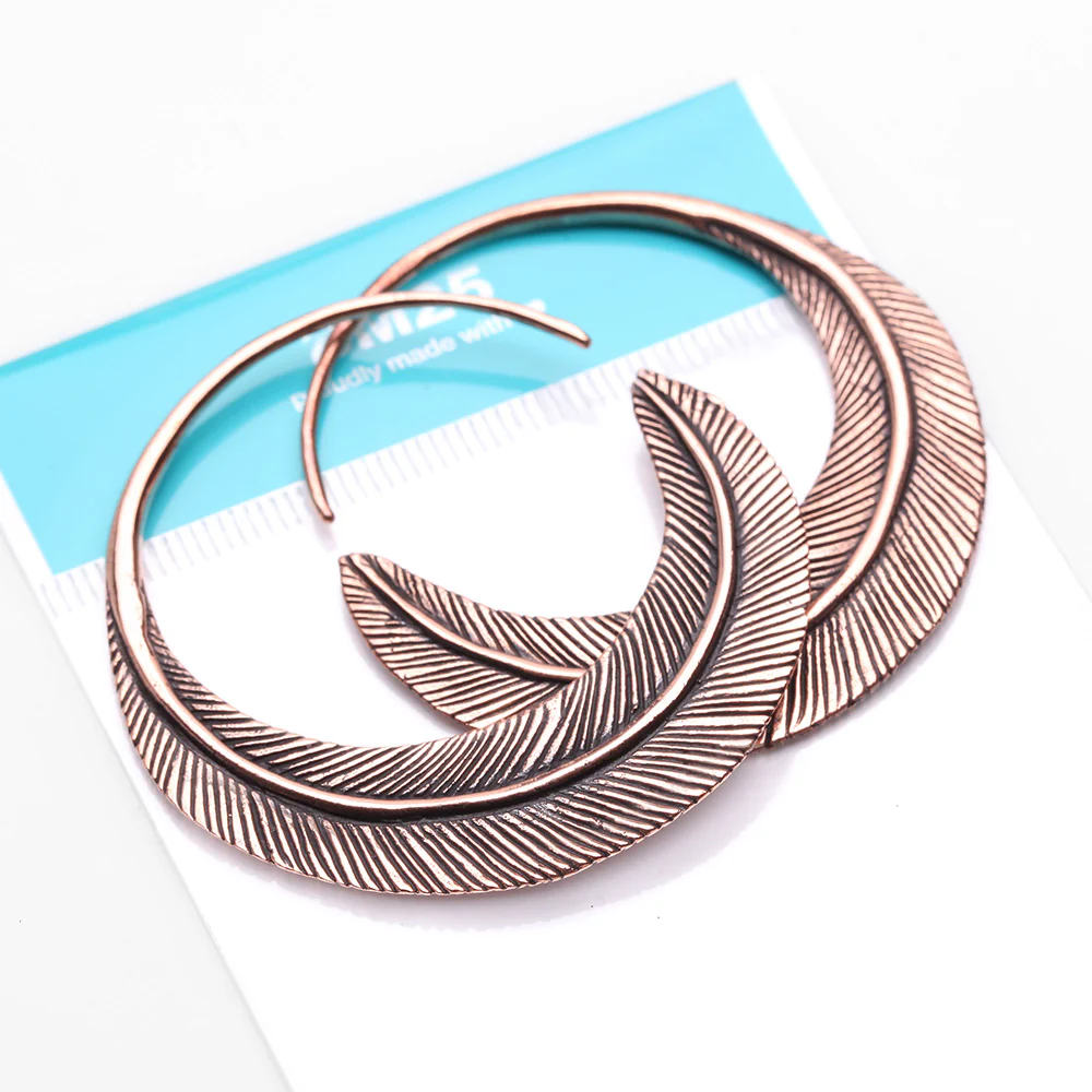 A Pair of Mystic Feather Loop Copper Plug Hoop Earring - Image 5