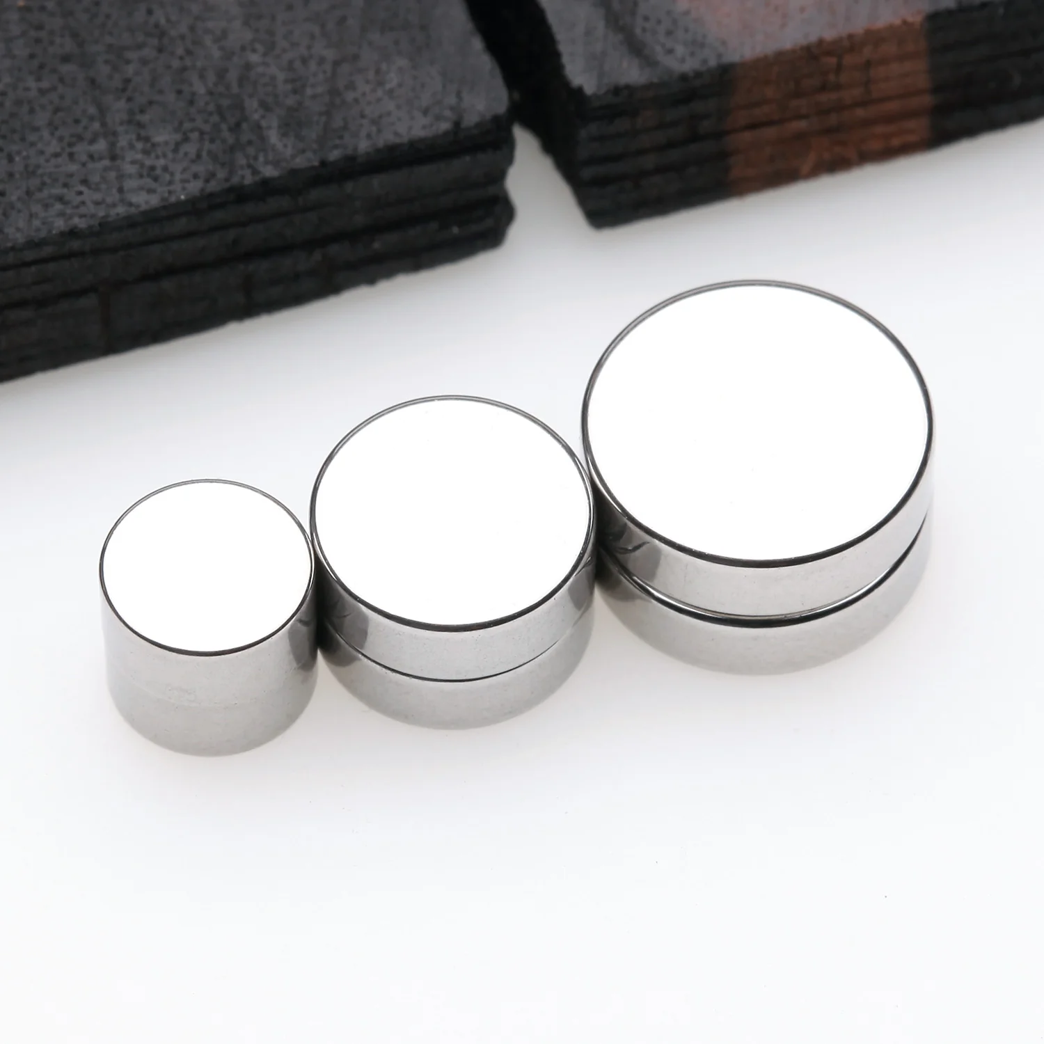 A Pair of Stainless Steel Magnetic Fake Plug Earring - Image 2