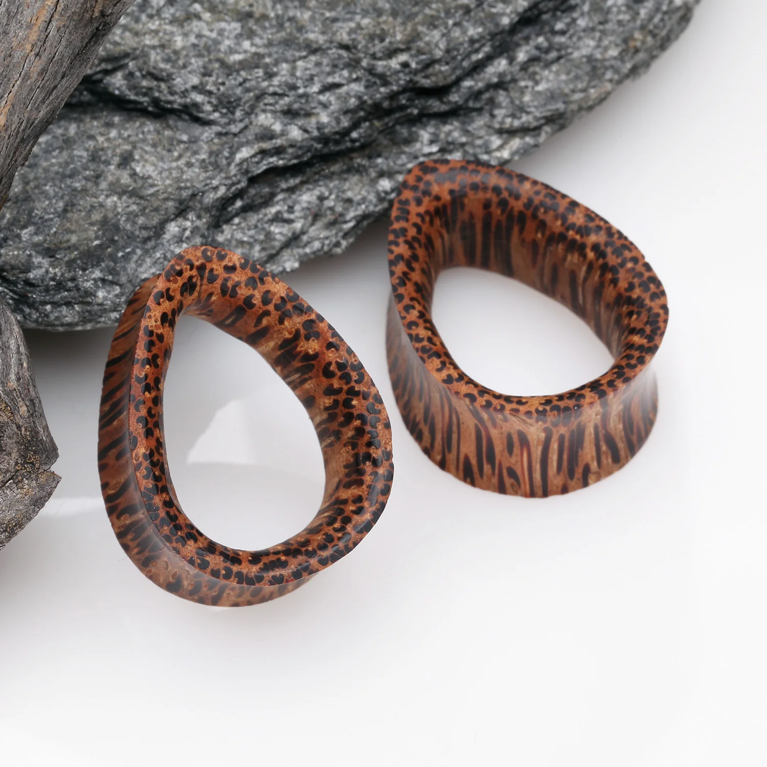 A Pair of Teardrop Coconut Wood Double Flared Tunnel Plug - Image 2