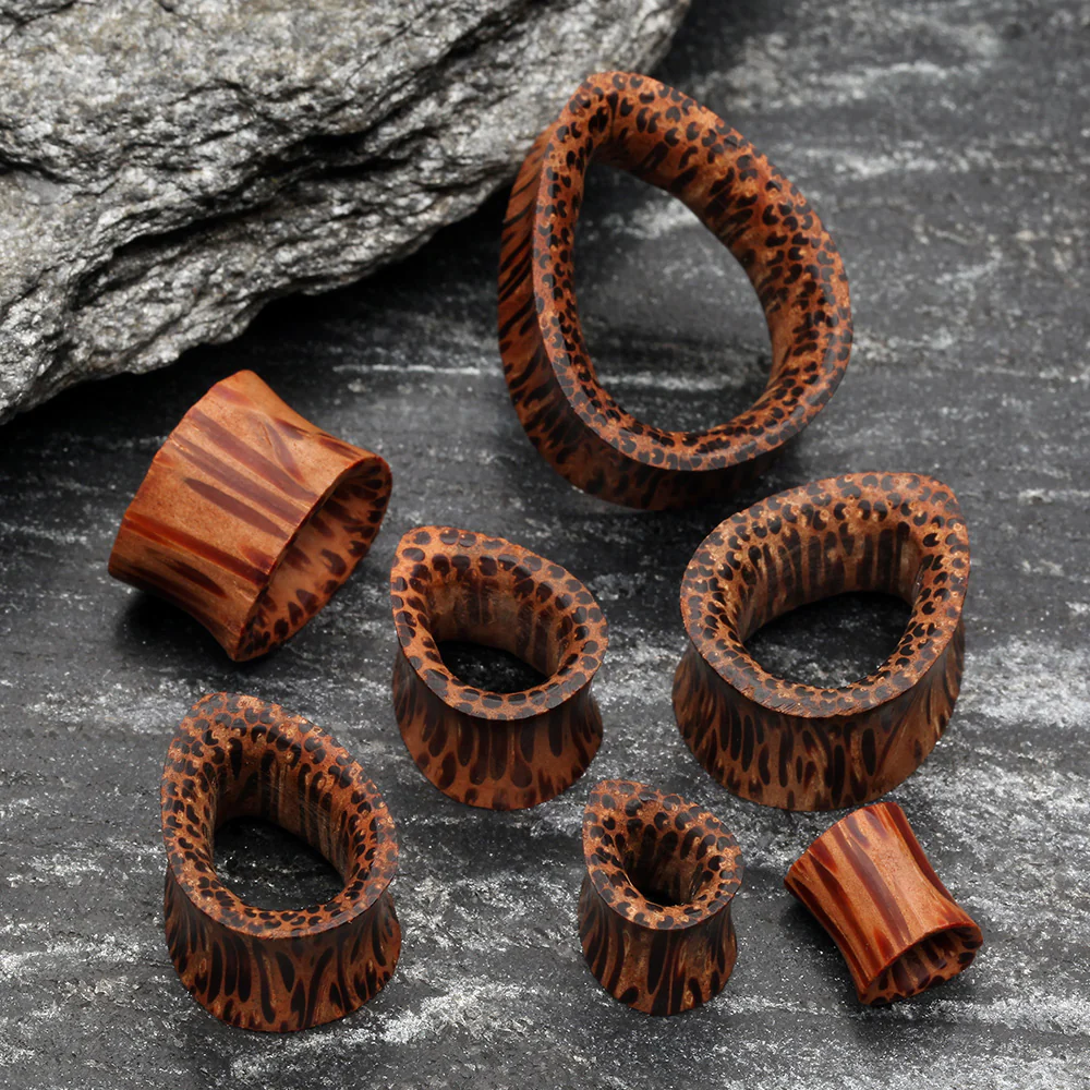 A Pair of Teardrop Coconut Wood Double Flared Tunnel Plug - Image 3