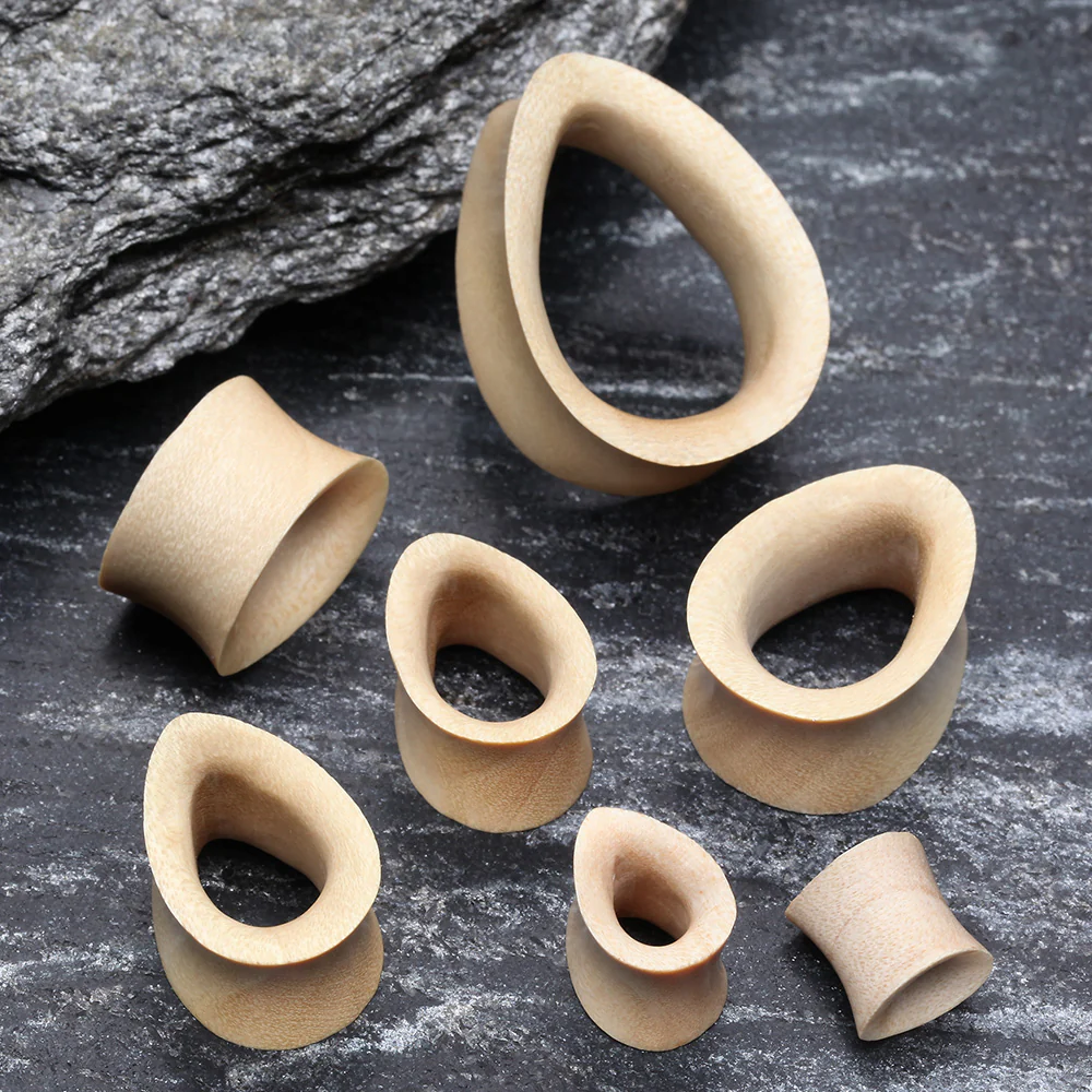 A Pair of Teardrop Crocodile Wood Double Flared Tunnel Plug - Image 3