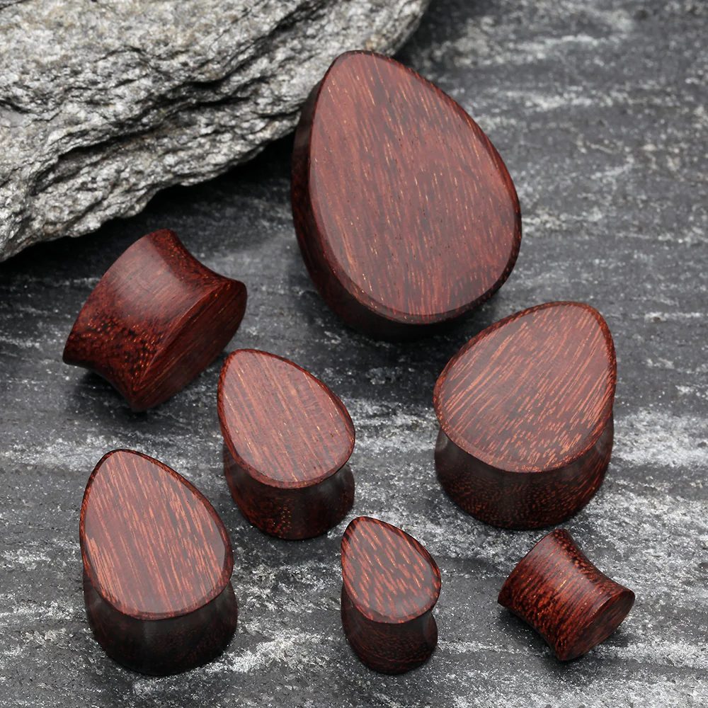 A Pair of Teardrop Dark Tamarind Wood Double Flared Plug - Image 3