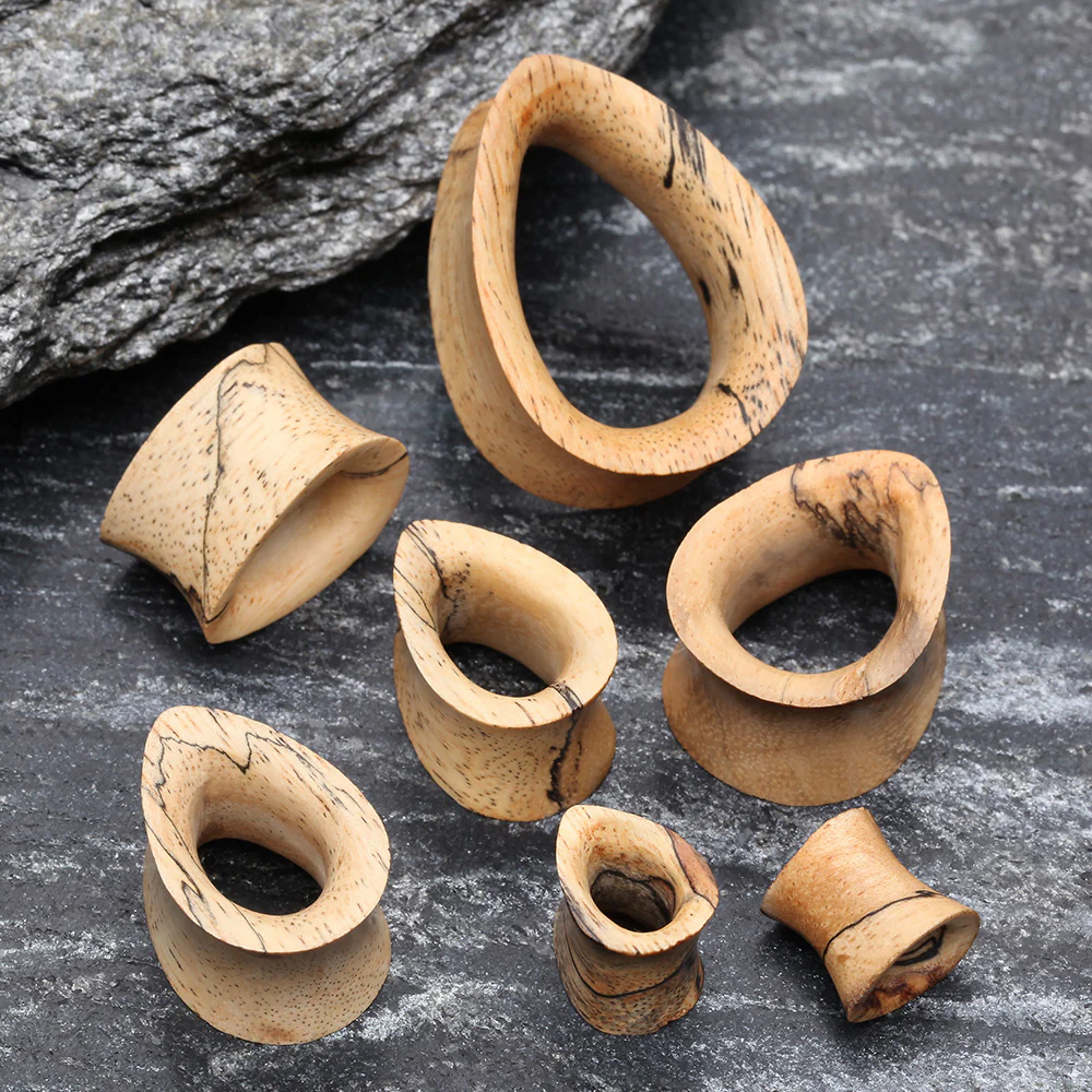 A Pair of Teardrop Old Tamarind Wood Double Flared Tunnel Plug - Image 3