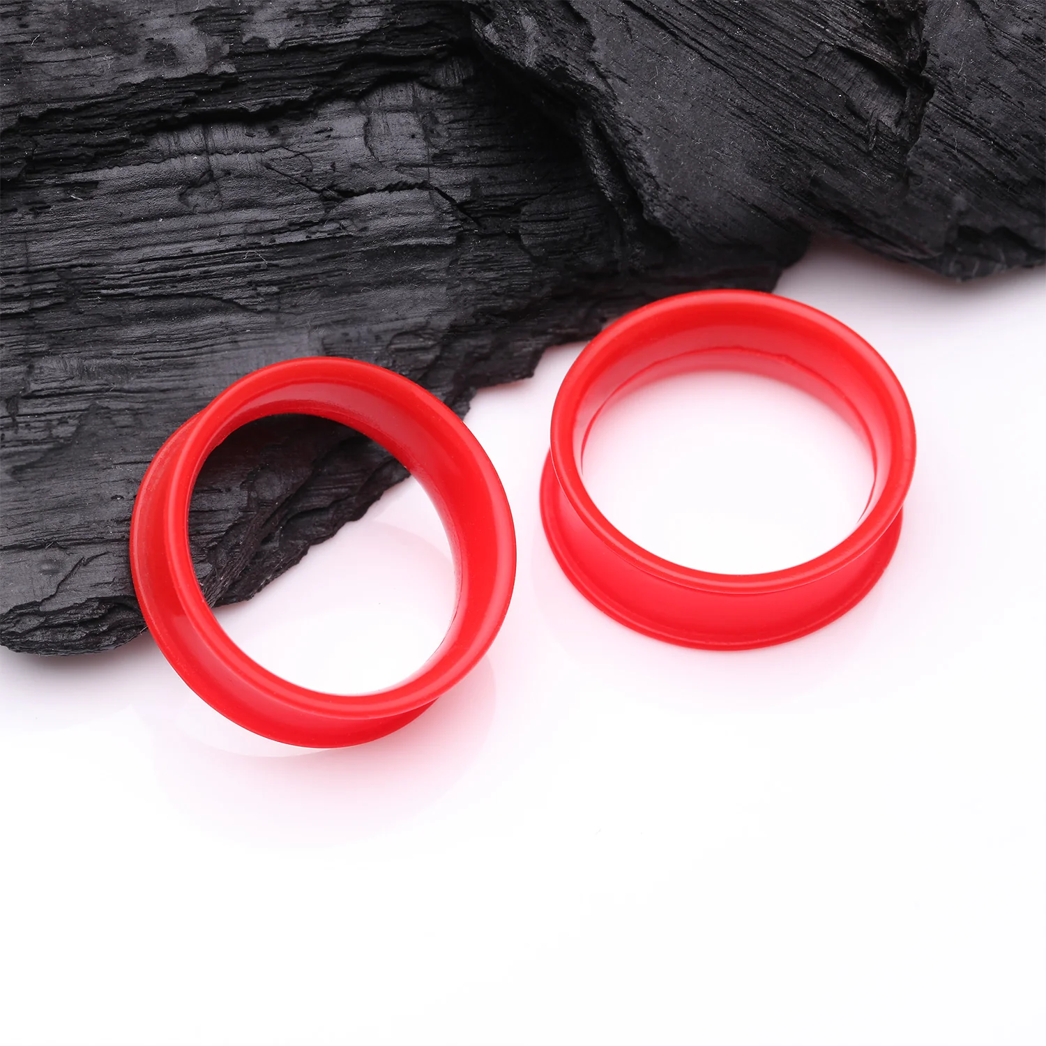 A Pair of Ultra Flexible Electro Red Silicone Double Flared Tunnel Plug - Image 2