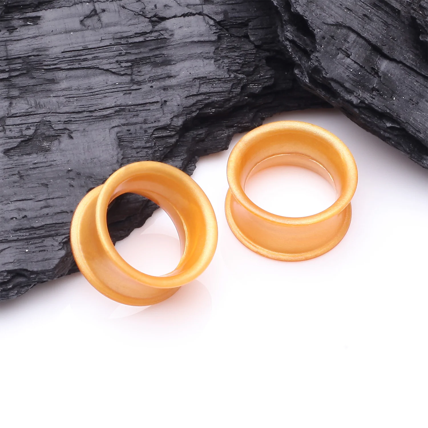 A Pair of Ultra Flexible Metallic Gold Silicone Double Flared Tunnel Plug - Image 2