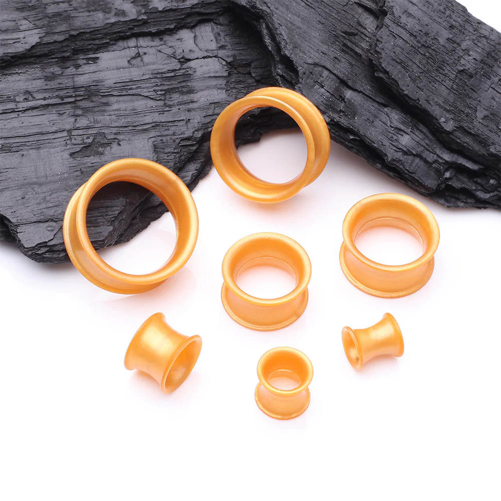 A Pair of Ultra Flexible Metallic Gold Silicone Double Flared Tunnel Plug - Image 3
