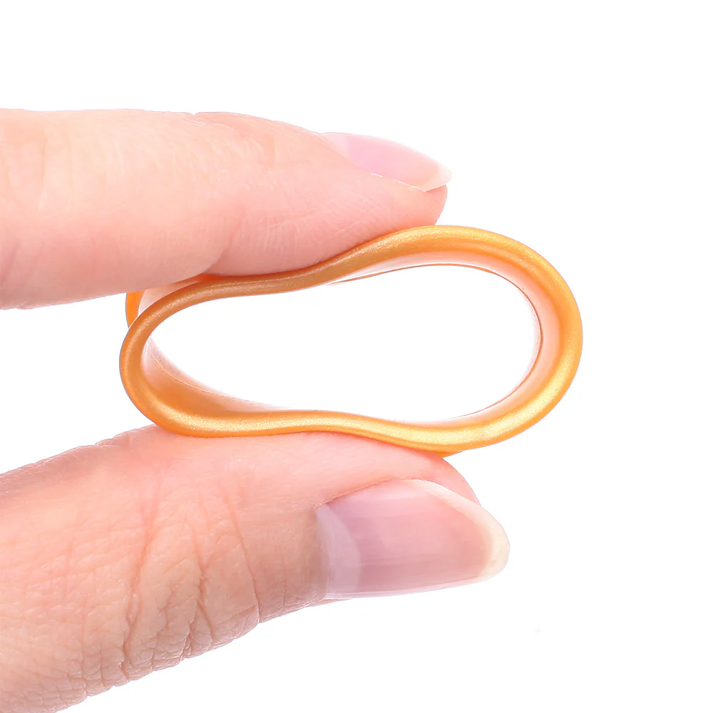 A Pair of Ultra Flexible Metallic Gold Silicone Double Flared Tunnel Plug - Image 4