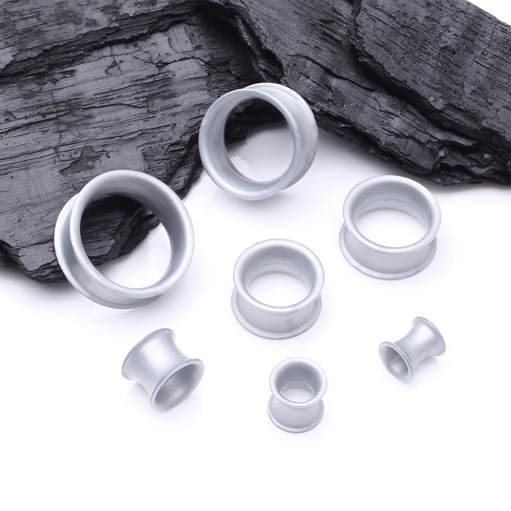 A Pair of Ultra Flexible Metallic Silver Silicone Double Flared Tunnel Plug - Image 3