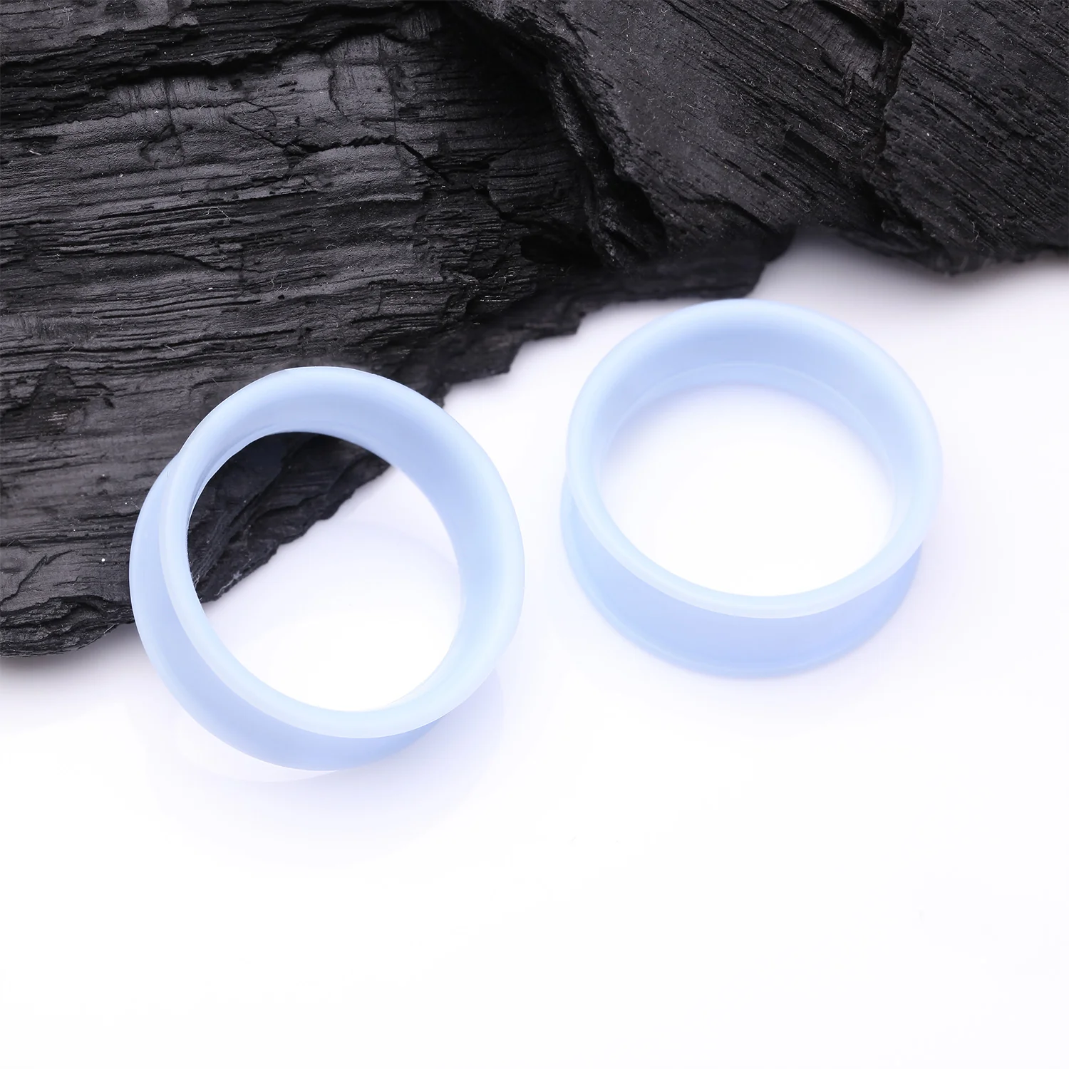 A Pair of Ultra Flexible Pastel Blue Silicone Double Flared Tunnel Plug - Image 2