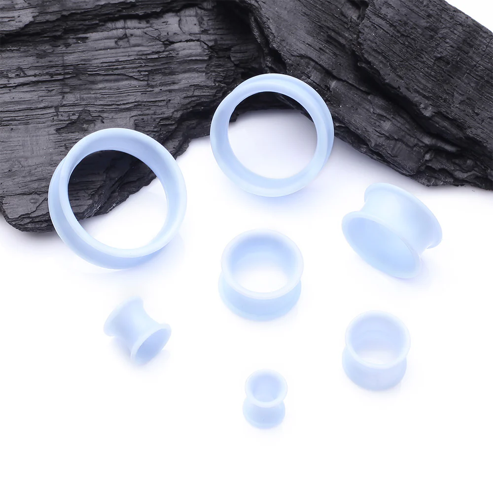 A Pair of Ultra Flexible Pastel Blue Silicone Double Flared Tunnel Plug - Image 3