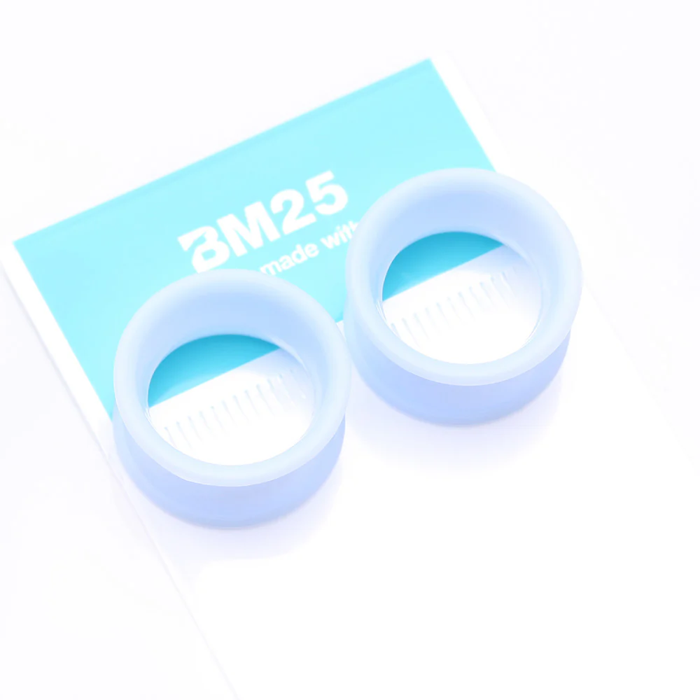 A Pair of Ultra Flexible Pastel Blue Silicone Double Flared Tunnel Plug - Image 5