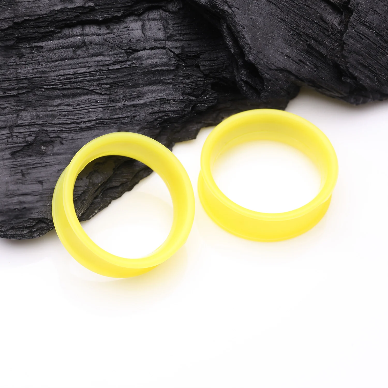 A Pair of Ultra Flexible Pastel Yellow Silicone Double Flared Tunnel Plug - Image 2