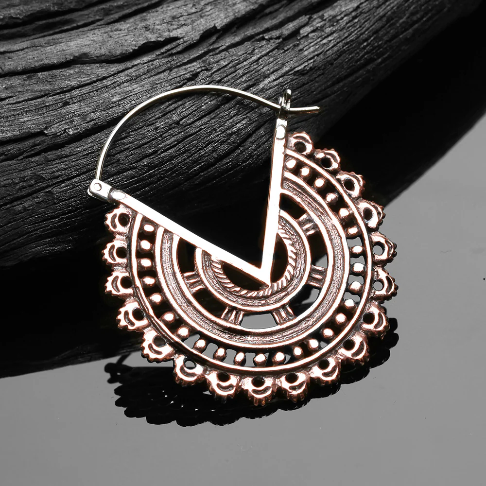 A Pair of Vintage Bali Warrior Emblem Copper Plug Hoop Earring - Image 3