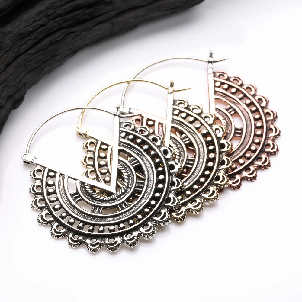 A Pair of Vintage Bali Warrior Emblem Copper Plug Hoop Earring - Image 4