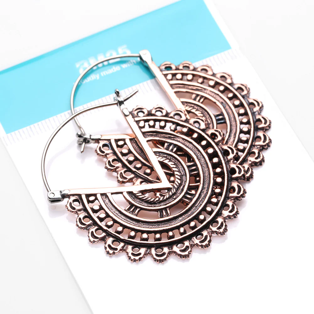 A Pair of Vintage Bali Warrior Emblem Copper Plug Hoop Earring - Image 5