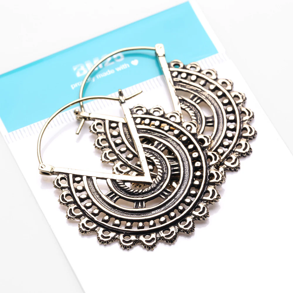 A Pair of Vintage Bali Warrior Emblem Golden Brass Plug Hoop Earring - Image 5