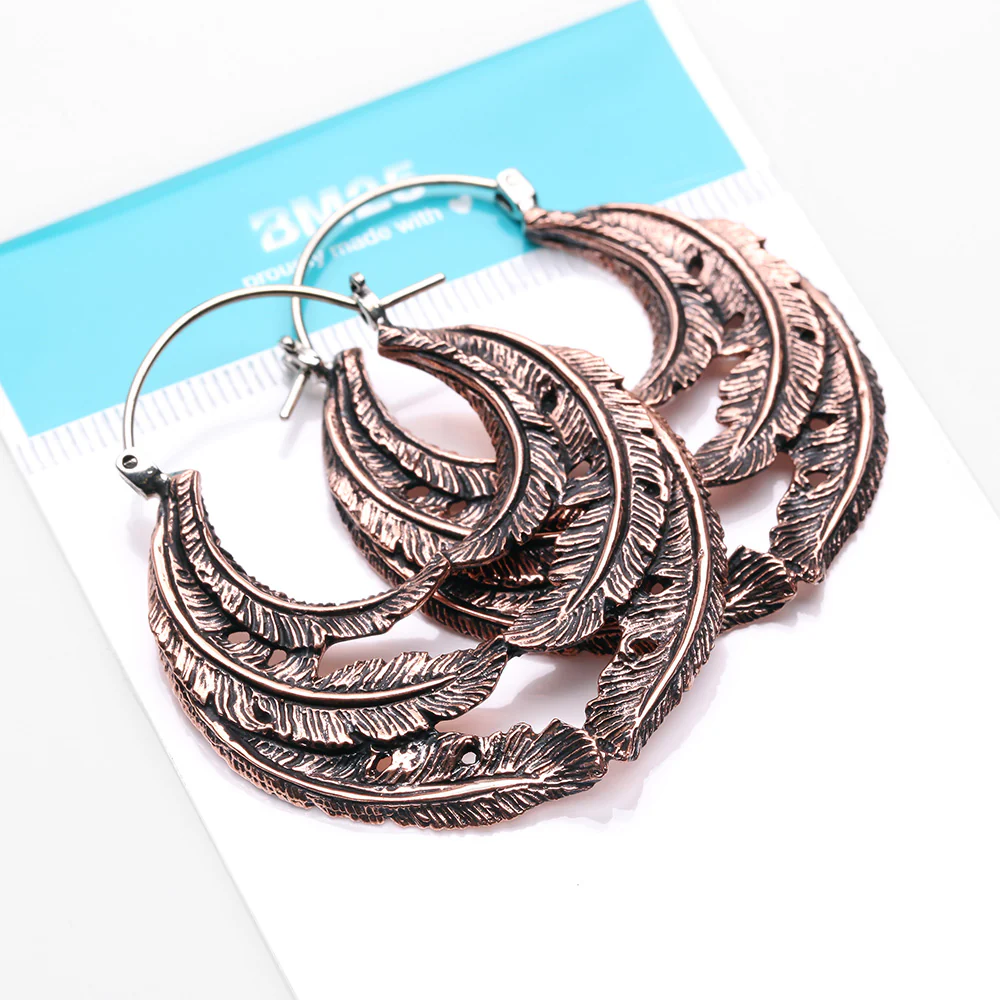 A Pair of Vintage Goddess Leaflet Loops Copper Plug Hoop Earring - Image 5
