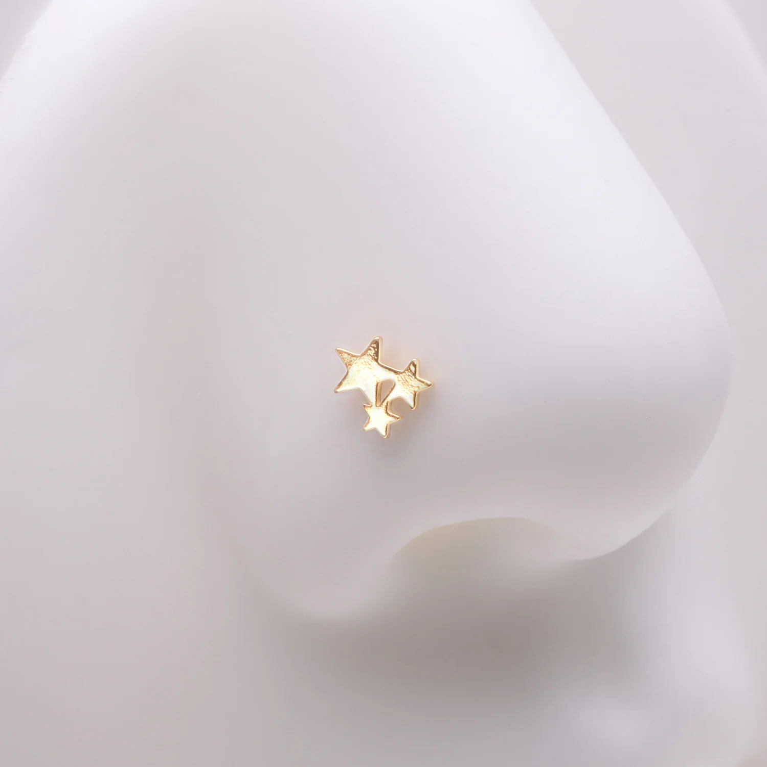 Golden Triple Star Icon L-Shaped Nose Ring - Image 2