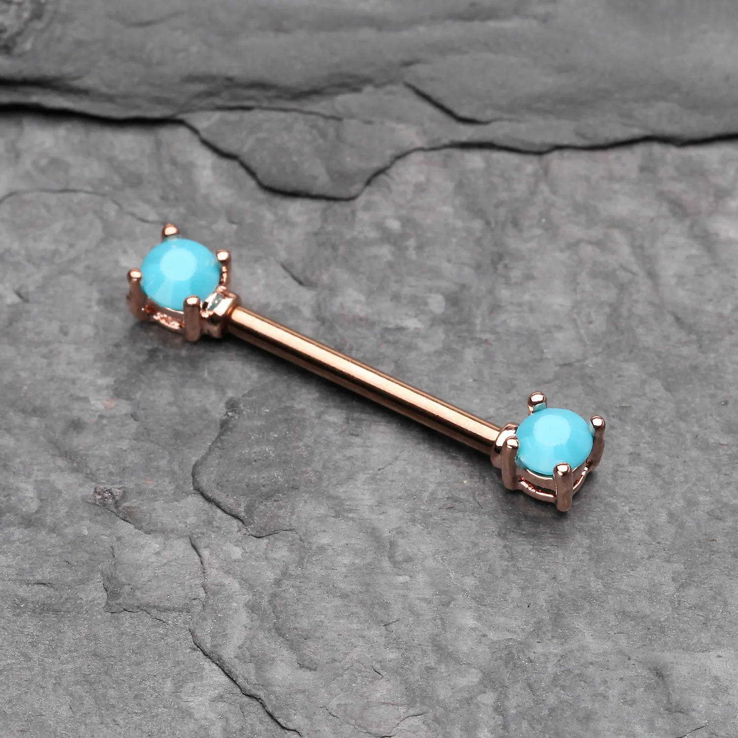 A Pair of Rose Gold Turquoise Bead Prong Nipple Barbell